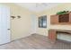 Bright bedroom featuring vinyl floors, a ceiling fan, and a built-in desk area at 87 Vivante Blvd # 8732, Punta Gorda, FL 33950