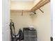Walk in closet with storage, wire shelving, and laminate flooring at 87 Vivante Blvd # 8732, Punta Gorda, FL 33950