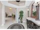 Entrance foyer with tile flooring, decor, and access to an open floorplan at 87 Vivante Blvd # 8732, Punta Gorda, FL 33950