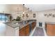 Kitchen with granite counters, stainless appliances, and an open concept design at 87 Vivante Blvd # 8732, Punta Gorda, FL 33950