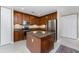 Well-equipped kitchen with granite countertops, stainless steel appliances, and a convenient center island at 87 Vivante Blvd # 8732, Punta Gorda, FL 33950