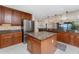 Spacious kitchen boasts stainless steel appliances, granite countertops, and a center island at 87 Vivante Blvd # 8732, Punta Gorda, FL 33950