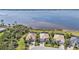 Scenic aerial view highlighting waterfront properties with lush landscaping and picturesque water vistas at 12905 N Marsh Dr, Port Charlotte, FL 33953