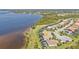 Breathtaking aerial shot of waterfront homes, capturing scenic water views and picturesque landscaping at 12905 N Marsh Dr, Port Charlotte, FL 33953