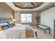 Comfortable bedroom with a large window, ceiling fan, and tasteful decor at 12905 N Marsh Dr, Port Charlotte, FL 33953