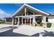 Clubhouse with a covered entrance and stone pillars at 12905 N Marsh Dr, Port Charlotte, FL 33953