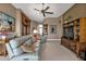 Comfortable living room with neutral tones and a ceiling fan at 12905 N Marsh Dr, Port Charlotte, FL 33953