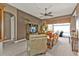 Open-concept living room with tan walls and water views at 12905 N Marsh Dr, Port Charlotte, FL 33953