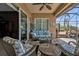 Relaxing screened-in patio with comfortable seating and views at 12905 N Marsh Dr, Port Charlotte, FL 33953