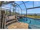 Beautiful pool with a connected hot tub at 12905 N Marsh Dr, Port Charlotte, FL 33953