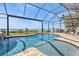 Beautiful pool with a spa, and waterfront view at 12905 N Marsh Dr, Port Charlotte, FL 33953