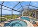 Beautiful pool with a spa, and waterfront view at 12905 N Marsh Dr, Port Charlotte, FL 33953