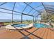 Beautiful pool with a spa and chairs near the waterfront at 12905 N Marsh Dr, Port Charlotte, FL 33953
