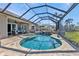 Beautiful pool with seating area and waterfront views at 12905 N Marsh Dr, Port Charlotte, FL 33953