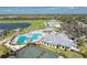 Resort-style community with swimming pool, tennis court, golf course, and clubhouse at 14091 Heritage Landing Blvd # 123, Punta Gorda, FL 33955