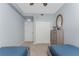 Bedroom features two twin beds and a closet at 14091 Heritage Landing Blvd # 123, Punta Gorda, FL 33955