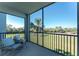 Enjoy green views from this screened lanai with seating, perfect for relaxing at 14091 Heritage Landing Blvd # 123, Punta Gorda, FL 33955