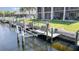 Waterfront property with a boat dock and lift, perfect for boating enthusiasts at 1423 Mediterranean Dr # C, Punta Gorda, FL 33950