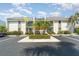Charming condo with well-maintained landscaping, a private balcony, and convenient parking at 1423 Mediterranean Dr # C, Punta Gorda, FL 33950