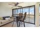 Enjoy the views from this lanai with seating and a ceiling fan at 1423 Mediterranean Dr # C, Punta Gorda, FL 33950