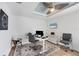 Bright home office featuring a modern desk, stylish rug, and contemporary decor at 14325 Mcfarland Ave, Port Charlotte, FL 33981