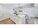 Spacious kitchen island offers ample storage, countertop space, and seamless connection to the dining area at 14325 Mcfarland Ave, Port Charlotte, FL 33981