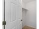 Walk-in closet providing ample storage space with a single shelf and hanging rod for organized clothing at 150 Harborside Ave # 304, Punta Gorda, FL 33950