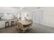 Open dining area with a pass-through to the kitchen and ample space at 150 Harborside Ave # 304, Punta Gorda, FL 33950