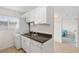 Convenient laundry area with modern washer and dryer, plus built-in cabinetry at 150 Harborside Ave # 304, Punta Gorda, FL 33950