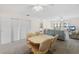 Spacious living room with large sliding closet doors and an open floor plan at 150 Harborside Ave # 304, Punta Gorda, FL 33950