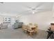 Bright living room featuring neutral tones, comfortable seating, and balcony access at 150 Harborside Ave # 304, Punta Gorda, FL 33950
