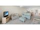 Inviting living room featuring neutral colors, comfortable seating, and tile flooring at 150 Harborside Ave # 304, Punta Gorda, FL 33950