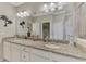 Bathroom featuring granite countertops and double sinks at 15033 Spanish Point Dr, Port Charlotte, FL 33981