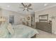 Bedroom featuring closet, bathroom and work area at 15033 Spanish Point Dr, Port Charlotte, FL 33981