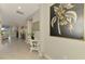 Hallway with decor; view extends to the dining and living areas at 15033 Spanish Point Dr, Port Charlotte, FL 33981