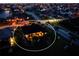An aerial nighttime view capturing a well-lit home and its surrounding neighborhood at 197 Colony Point Dr, Punta Gorda, FL 33950