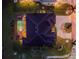 Aerial view of home featuring a private pool, manicured landscaping, and circular driveway at 197 Colony Point Dr, Punta Gorda, FL 33950