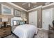 This bedroom features neutral paint, bright white trim, and a ceiling fan at 197 Colony Point Dr, Punta Gorda, FL 33950