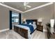 Bedroom featuring a wooden bed frame, soft carpet, and neutral walls for a cozy atmosphere at 197 Colony Point Dr, Punta Gorda, FL 33950