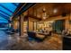 Extended lanai with outside kitchen, seating area, and lounges overlooking the pool at 197 Colony Point Dr, Punta Gorda, FL 33950