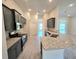 Modern kitchen with dark wood cabinets, stainless steel appliances, and granite countertops at 2201 Como St, Port Charlotte, FL 33948