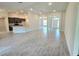 Expansive living room showcasing an open layout that connects to the kitchen and dining areas at 2201 Como St, Port Charlotte, FL 33948