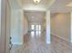 Spacious and bright living room with open floor plan and tile floors at 2201 Como St, Port Charlotte, FL 33948