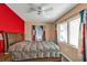 Bedroom with a queen bed, ceiling fan and lots of light at 2440 Ednor St, Port Charlotte, FL 33952