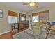 Bedroom features a dresser, work space, a chair and neutral colors at 2440 Ednor St, Port Charlotte, FL 33952