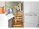 Functional laundry room with washer, dryer, and storage space at 2440 Ednor St, Port Charlotte, FL 33952