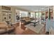 Cozy living room featuring hardwood floors, neutral paint, with views into other rooms at 2440 Ednor St, Port Charlotte, FL 33952