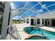 Enjoyable backyard pool and screened-in patio area, great for entertaining and enjoying the outdoors at 26102 Ancuda Dr, Punta Gorda, FL 33983