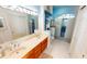 Beautiful bathroom with double sinks, and a luxurious glass enclosed shower at 26287 Stillwater Cir, Punta Gorda, FL 33955