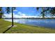 Picturesque view of a tranquil pond, enhancing the property's serene ambiance at 26287 Stillwater Cir, Punta Gorda, FL 33955